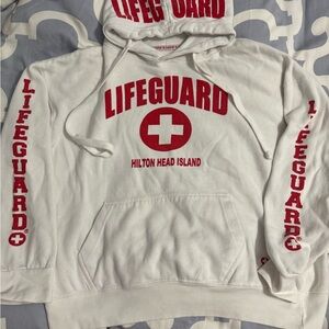 White Lifeguard Hoodie with Red Print. Unisex